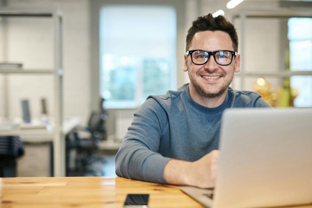 A digital marketing freelancer smiling